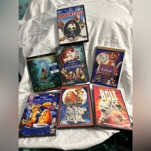 Disney Classic DVD Collection - Red, Blue, Purple, Green Covers 7 total